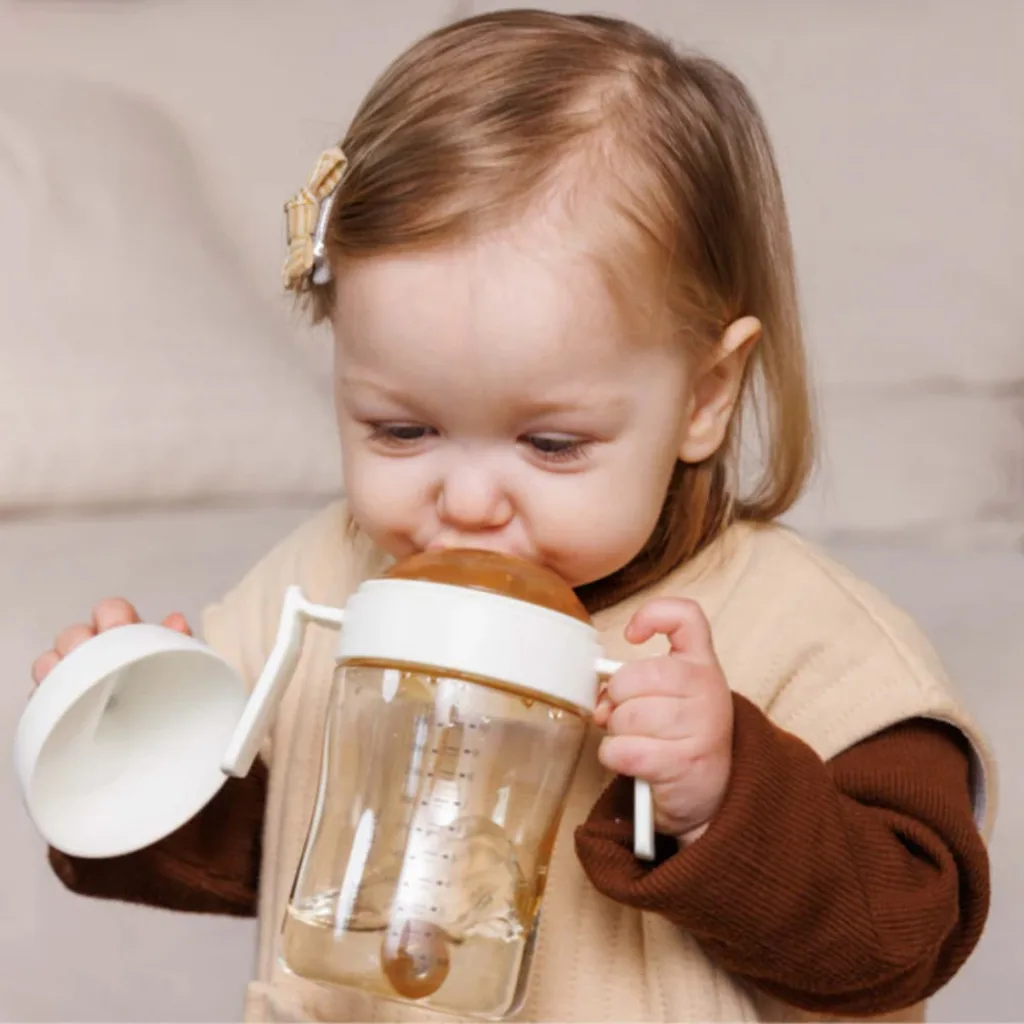 آبمیوه خوری 9+ماه 300میل دسته دار سوپاپدار هی اور شی Heorshe