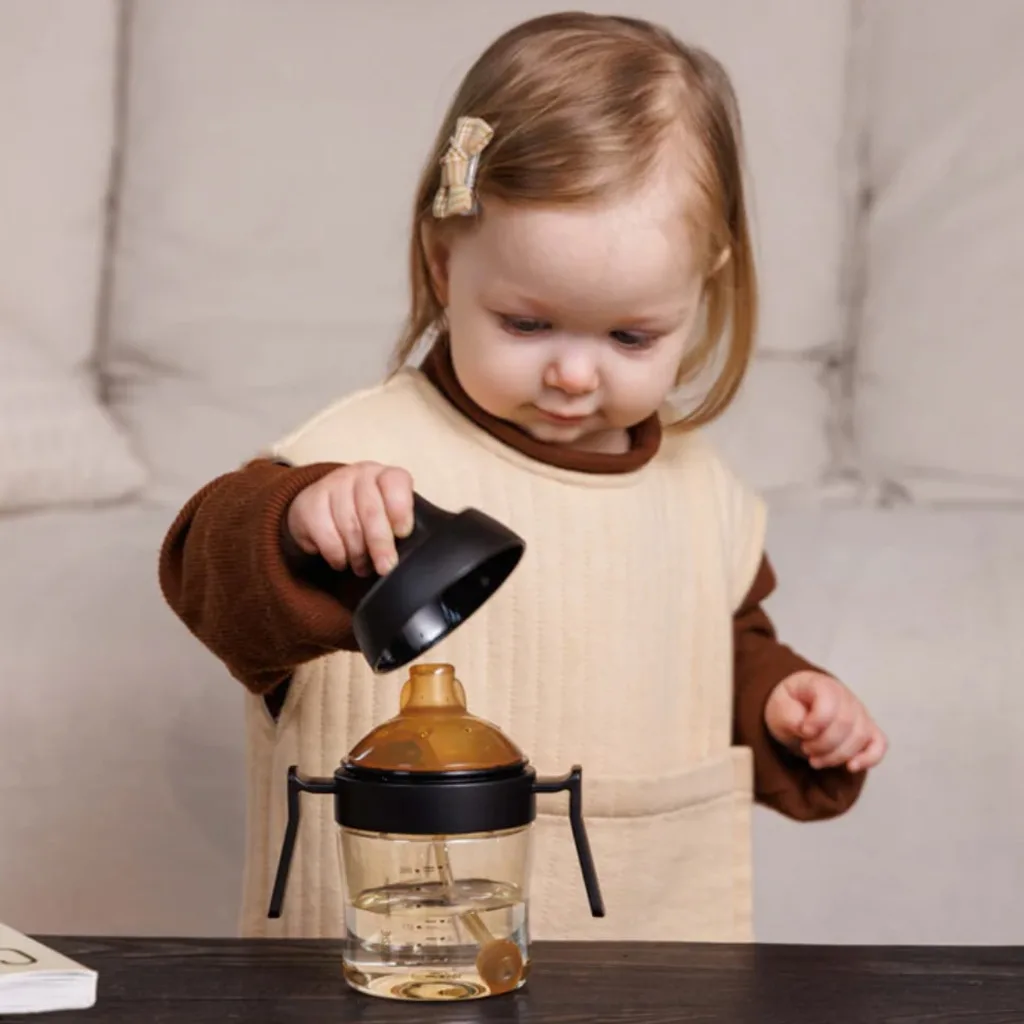 آبمیوه خوری 9+ماه 300میل دسته دار سوپاپدار هی اور شی Heorshe