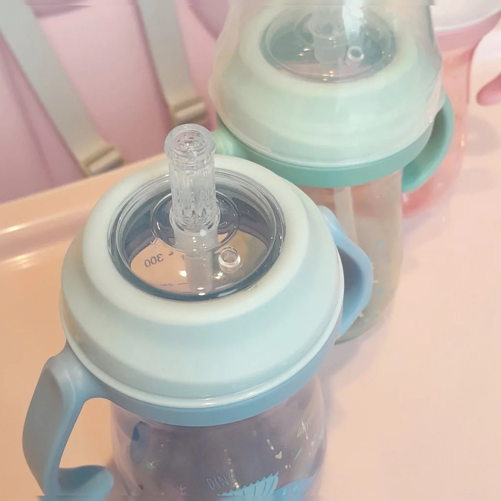 لیوان آبمیوه خوری کیکابو نی دار مدل Dino World دسته دار 300میل Kikkaboo